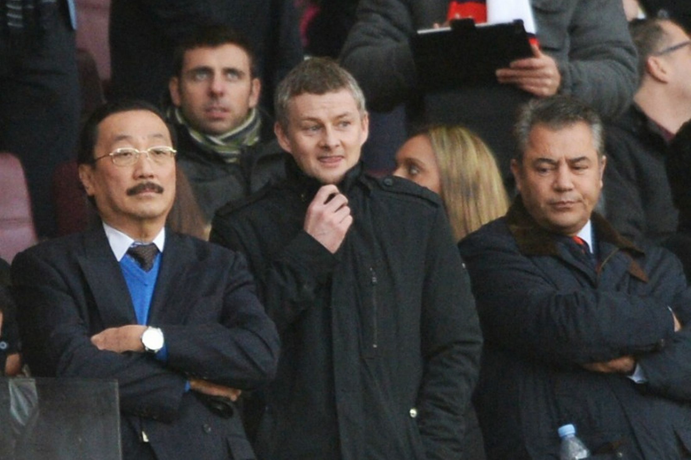 Prospective new manager Ole Gunnar Solskjaer with Vincent Tan and Mehmet Dalman at yesterday's match. The colour of Mr Tan's jumper attracted much comment amid rumours that Solskjaer had made a return to blue a condition of him agreeing to the job - can't see it being true myself, but you can but hope!  