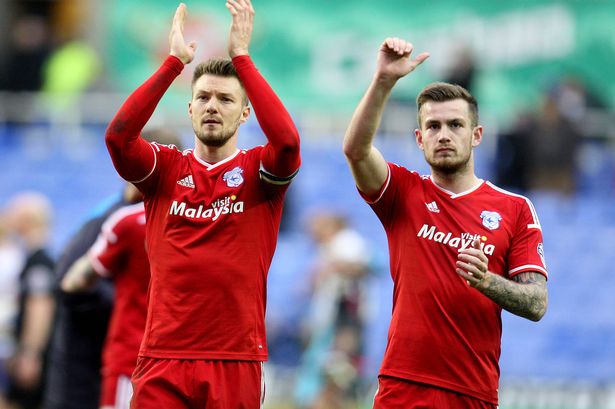 Captain Anthony Pilkington and Joe Ralls acknowledge the sizable away following after the final whistle. * 