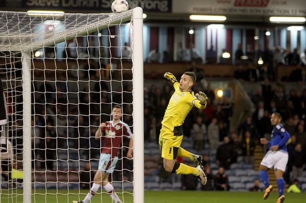 Just a few inches lower..........Kenneth Zohore watches his lob rebound off Tom Heaton's bar during his effective stint as a sub last night. This could become an 